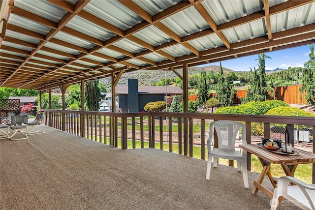 view of patio with a fenced backyard and a mountain view