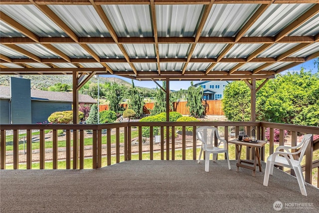 view of patio featuring fence