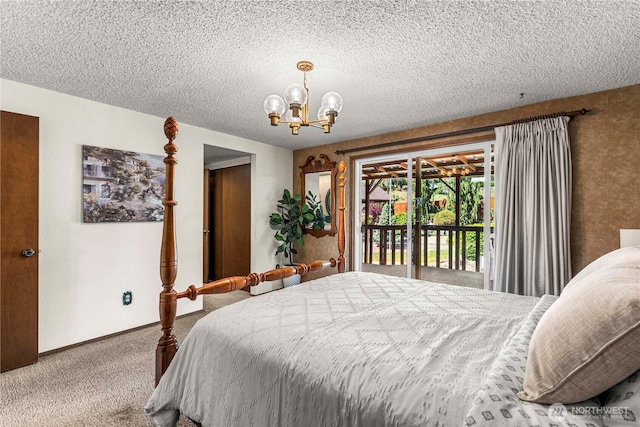 carpeted bedroom featuring a chandelier, access to outside, and a textured ceiling