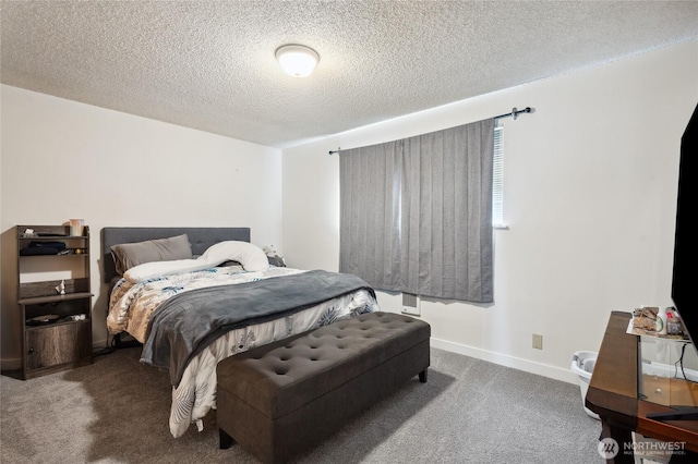 carpeted bedroom featuring a textured ceiling and baseboards
