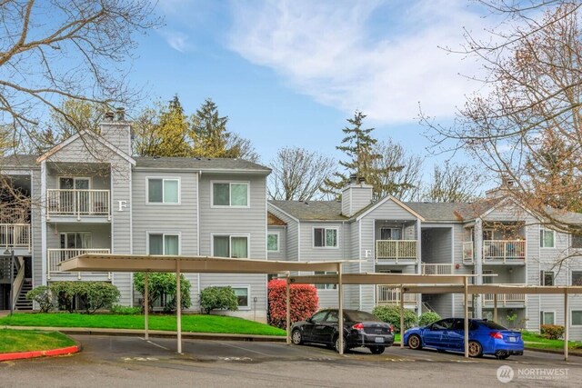 975 Aberdeen Ave NE Unit F207, Renton, WA 98056 - view of property with covered parking