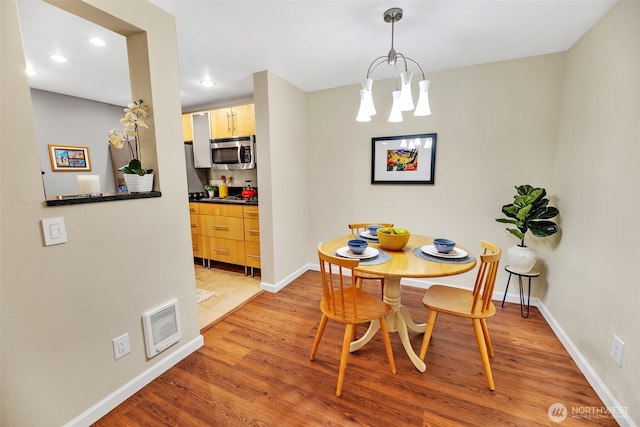 975 Aberdeen Ave NE Unit F207, Renton, WA 98056 - dining space featuring light wood-type flooring, baseboards, visible vents, and recessed lighting