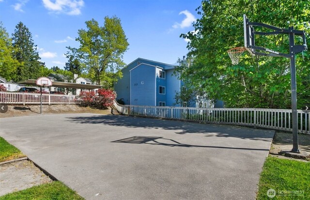 975 Aberdeen Ave NE Unit F207, Renton, WA 98056 - view of basketball court featuring fence and basketball hoop