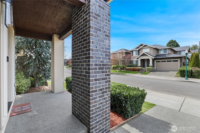 view of patio / terrace with a residential view