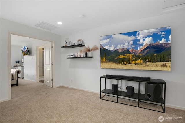 interior space with carpet floors, baseboards, and visible vents