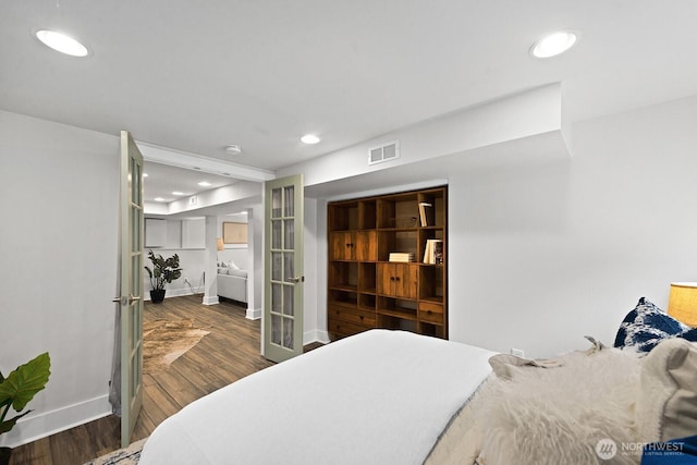 3236 15th Ave S, Seattle, WA 98144 - bedroom featuring baseboards, wood finished floors, and recessed lighting