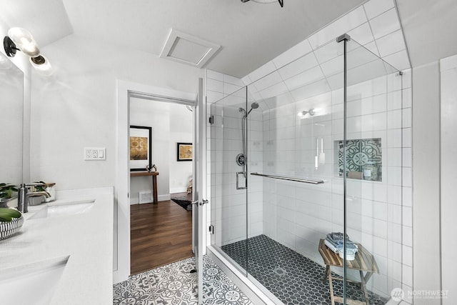 3236 15th Ave S, Seattle, WA 98144 - ensuite bathroom featuring tile patterned floors, a shower stall, and double vanity