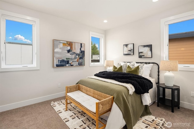 carpeted bedroom with recessed lighting and baseboards