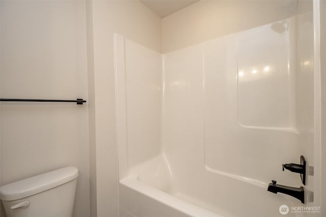 full bathroom featuring toilet and shower / washtub combination