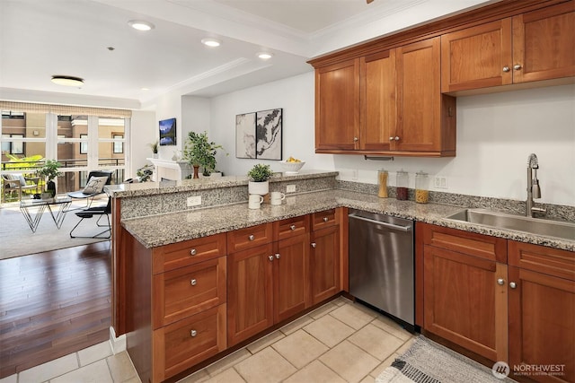10047 Main St Unit 413, Bellevue, WA 98004 - kitchen featuring dishwasher, a sink, a peninsula, brown cabinets, and open floor plan