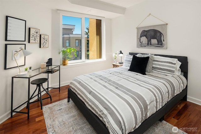 10047 Main St Unit 413, Bellevue, WA 98004 - bedroom with wood finished floors and baseboards