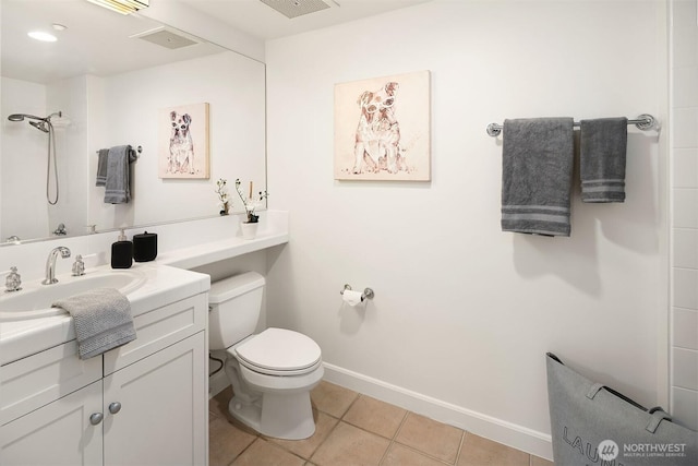 10047 Main St Unit 413, Bellevue, WA 98004 - full bathroom with tile patterned floors, toilet, vanity, baseboards, and a shower