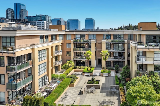 10047 Main St Unit 413, Bellevue, WA 98004 - view of apartment building / complex featuring a view of city