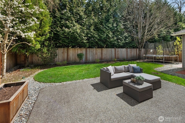 view of patio / terrace featuring a fenced backyard, outdoor lounge area, and a trampoline