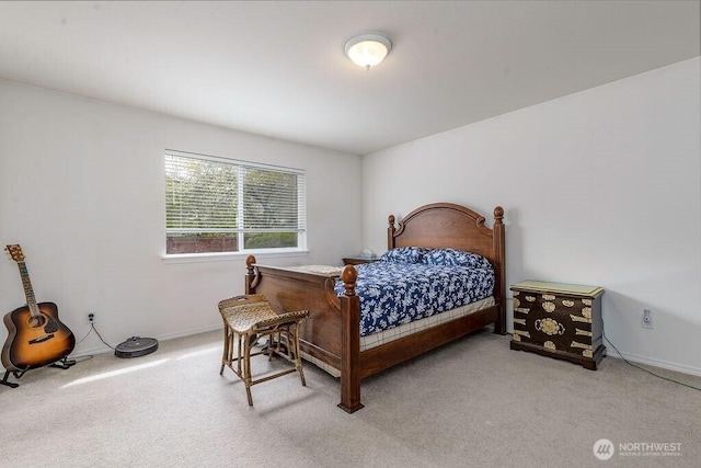 bedroom featuring baseboards and carpet flooring