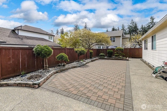 view of patio with a fenced backyard