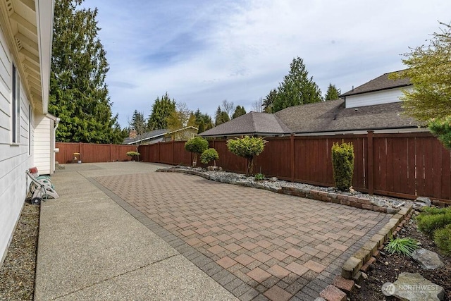 view of patio with a fenced backyard