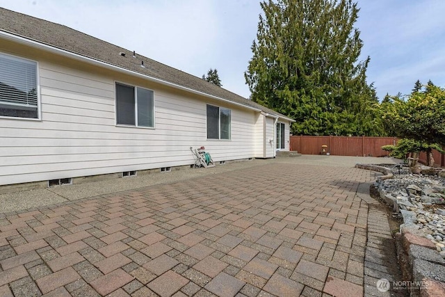 view of patio with fence