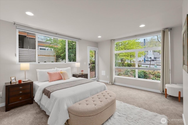 bedroom featuring baseboards, multiple windows, carpet, and recessed lighting