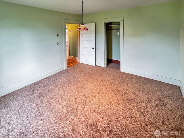 interior space featuring baseboards