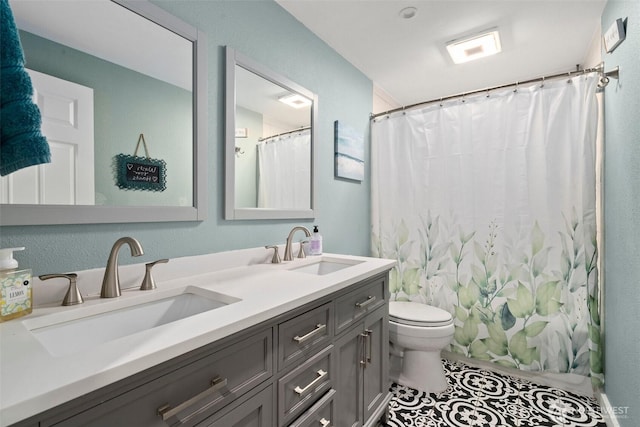 8207 Woodbourne Dr SW, Lakewood, WA 98499 - full bathroom with toilet, curtained shower, double vanity, and a sink