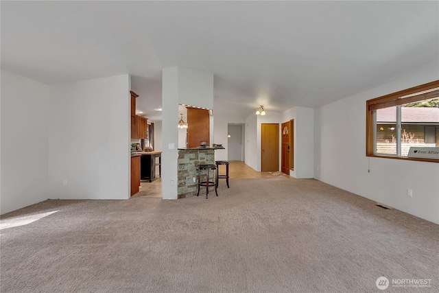 28529 298th Pl SE, Ravensdale, WA 98051 - unfurnished living room featuring visible vents and light colored carpet