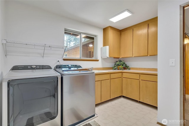 28529 298th Pl SE, Ravensdale, WA 98051 - clothes washing area featuring washing machine and clothes dryer, a sink, and cabinet space