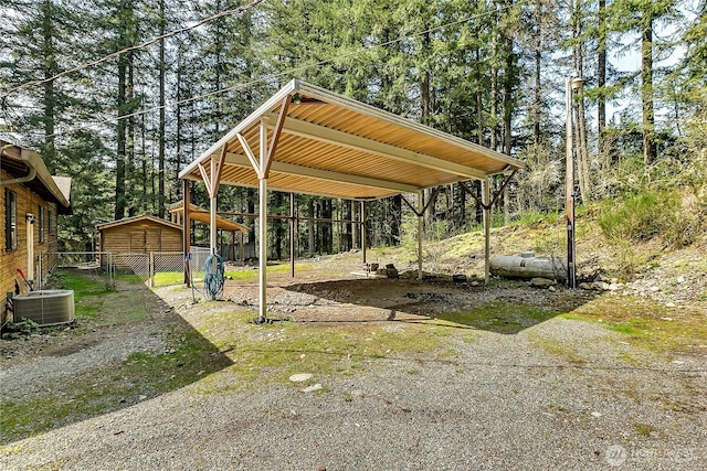 28529 298th Pl SE, Ravensdale, WA 98051 - surrounding community with a carport, fence, and driveway