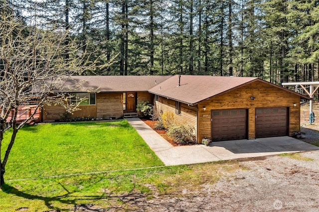 28529 298th Pl SE, Ravensdale, WA 98051 - view of front of home featuring driveway, a front lawn, a shingled roof, and a garage