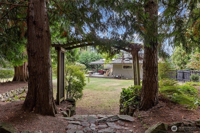 view of yard featuring a gazebo and fence