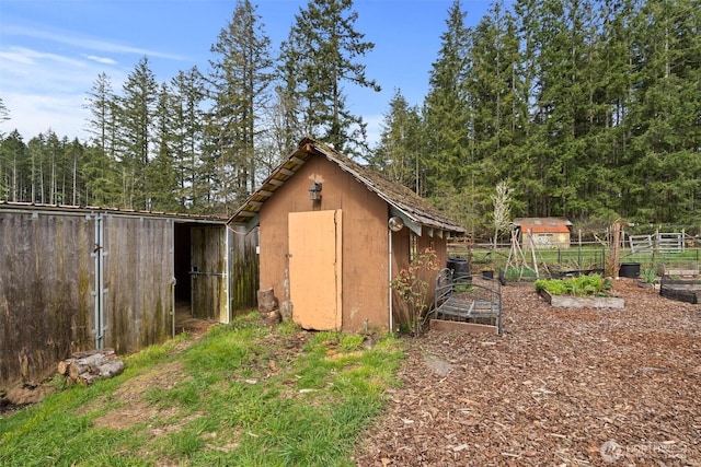 view of shed featuring a garden