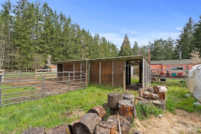 view of outdoor structure featuring an outbuilding and an exterior structure