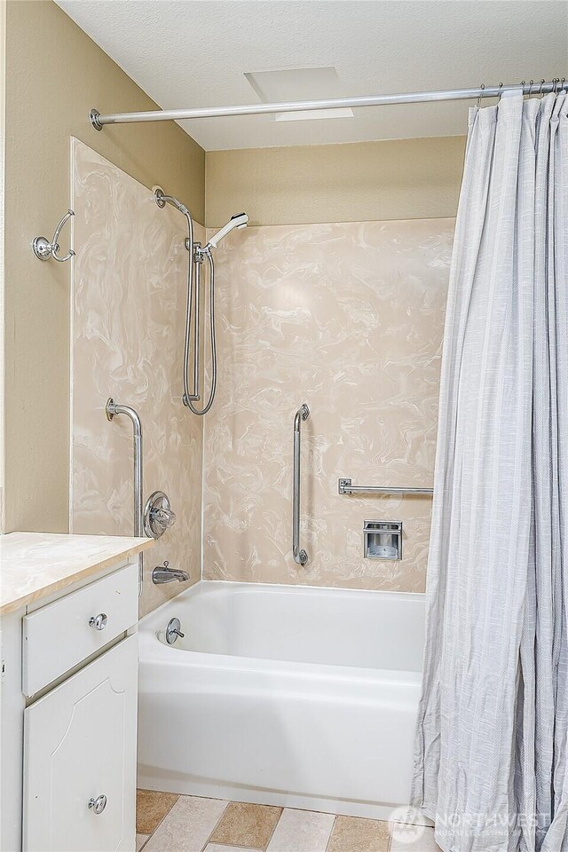 full bathroom featuring shower / tub combo and vanity