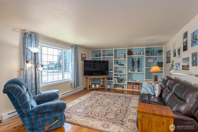 291 C St SE, Ephrata, WA 98823 - living area featuring baseboard heating and wood finished floors