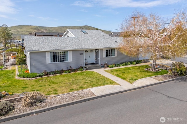 291 C St SE, Ephrata, WA 98823 - view of front of property with a mountain view and a shingled roof