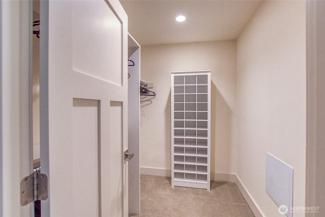 spacious closet featuring carpet flooring and visible vents