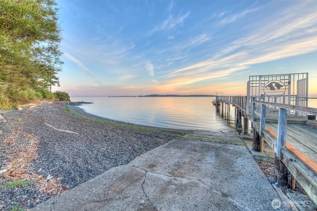 dock area featuring a water view