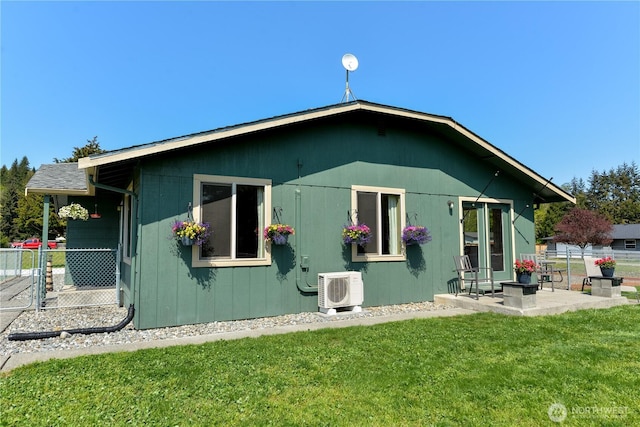 790 N Rhodefer Rd, Sequim, WA 98382 - back of house featuring a lawn, a patio, ac unit, and fence