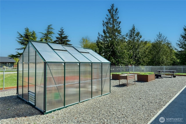 790 N Rhodefer Rd, Sequim, WA 98382 - view of greenhouse with a vegetable garden and fence