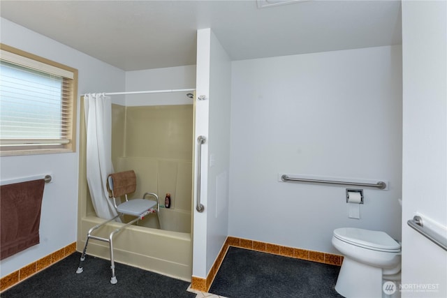790 N Rhodefer Rd, Sequim, WA 98382 - bathroom with toilet, shower / bath combination with curtain, and baseboards