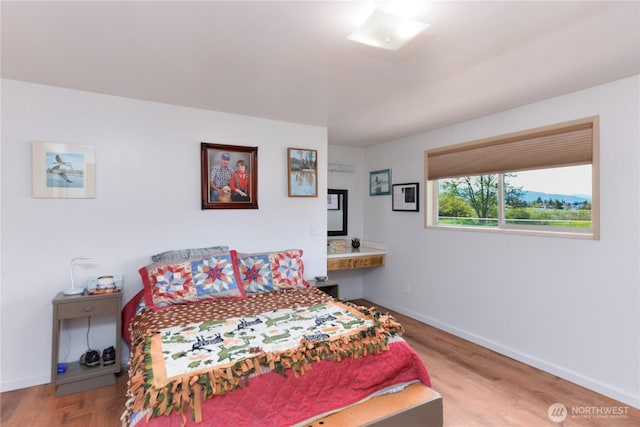790 N Rhodefer Rd, Sequim, WA 98382 - bedroom featuring wood finished floors and baseboards
