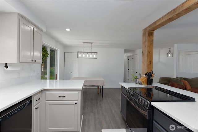 kitchen with light countertops, electric range oven, dishwasher, and white cabinetry
