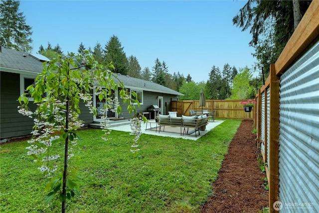 view of yard with a patio, a fenced backyard, and an outdoor hangout area