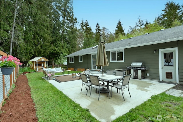 view of patio with fence, a gazebo, an outdoor living space, and grilling area