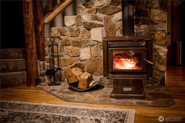 139 Mount Rainier Dr, Packwood, WA 98361 - room details with a wood stove and wood finished floors