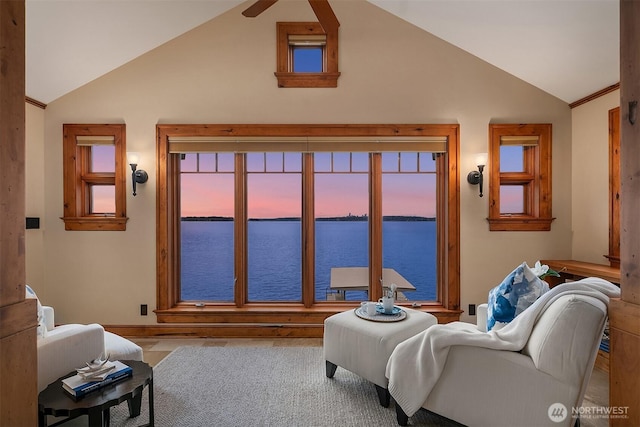 137 Lake Ave W, Kirkland, WA 98033 - living area with a water view, baseboards, and lofted ceiling