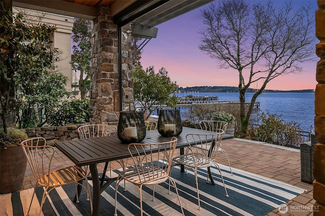 137 Lake Ave W, Kirkland, WA 98033 - patio terrace at dusk with a water view and outdoor dining area