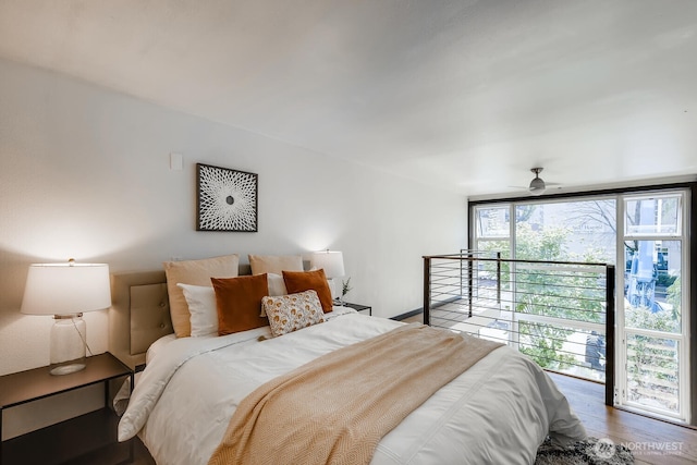 bedroom featuring access to outside, ceiling fan, and wood finished floors