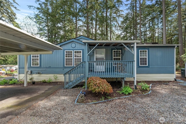 manufactured / mobile home featuring covered porch