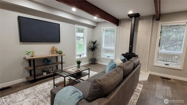 2205 135th Pl SE, Bellevue, WA 98005 - living room with baseboards, beamed ceiling, wood finished floors, recessed lighting, and a wood stove